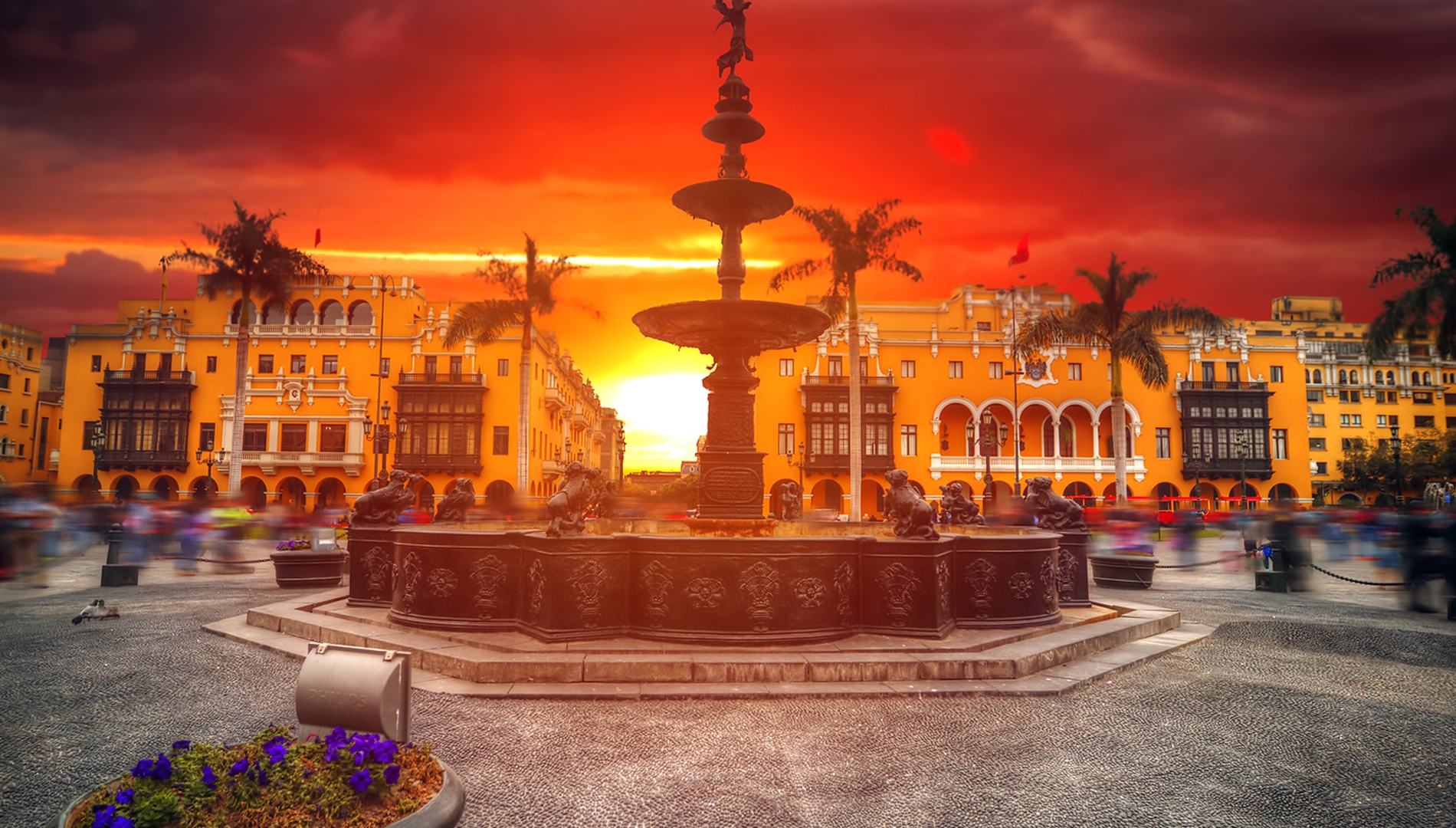 Enjoy a panoramic view of the sunset at Lima's Main Square