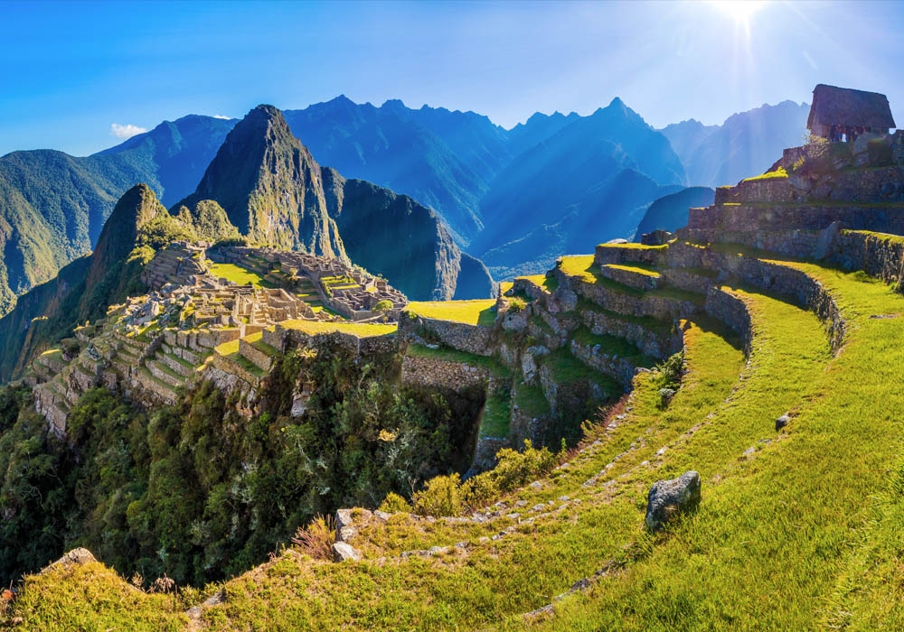 spectacular shot of Machu Picchu surrounded by the Andes mountains