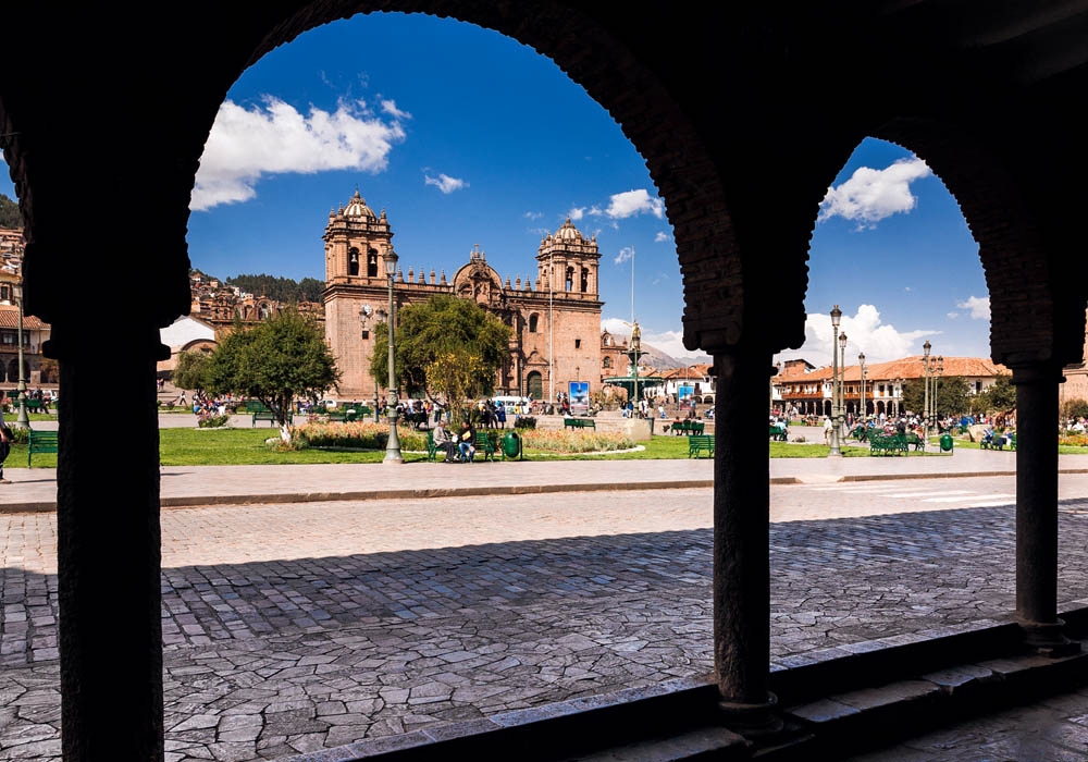 The portals of Cusco are a beautiful architectural feature with carved stone arches and ornate balconies