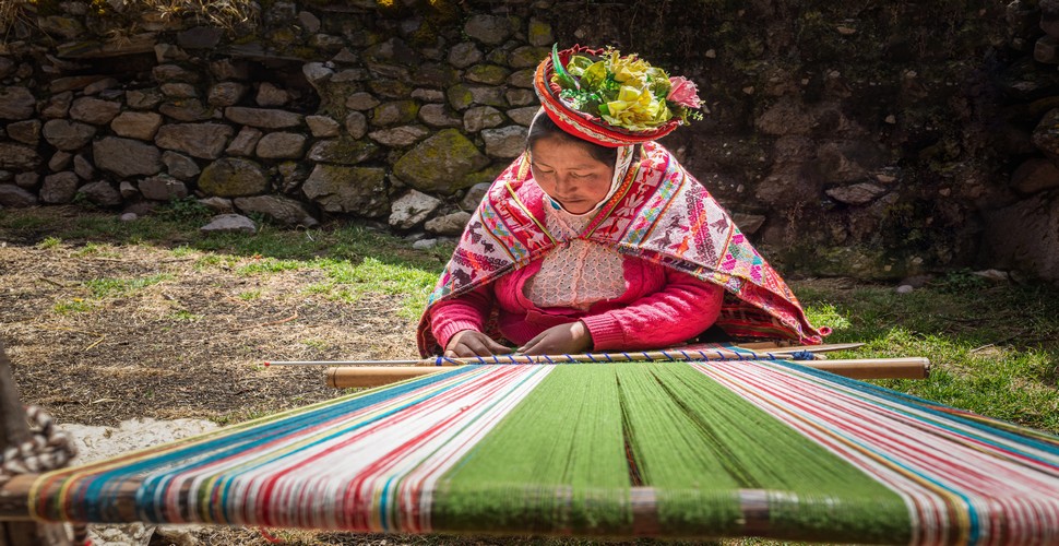 Spend 2 weeks in Peru on our Color of Peru tour and visit the Huilloc weaving community. Visitors to the Sacred Valley can visit the Huilloc community and learn about their way of life. This includes their agricultural techniques, weaving traditions, and cultural beliefs.