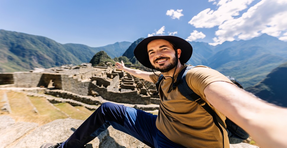 Take selfies or ask permission when taking photos when you visit Peru. Always be respectful of local customs on your Machu Picchu tours from Cusco.
