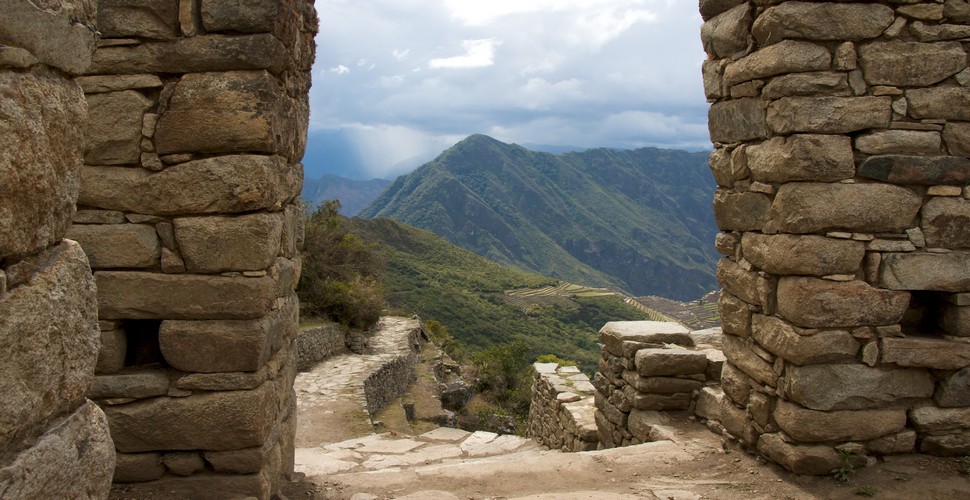 The first view of Machu Picchu for trekkers when they hike the Inca Trail to Machu Picchu is from the Sun gate. This vantage point offers a stunning panoramic view of Machu Picchu nestled among the surrounding mountains.