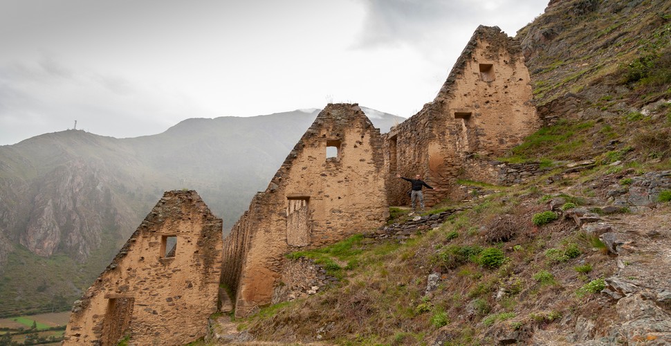The Pinkuylluna granaries are constructed of stone and are built into the mountainside, blending seamlessly with the natural environment. See the site on Peru luxury tours as you pass by on The Hiram Bingham luxury train. 
