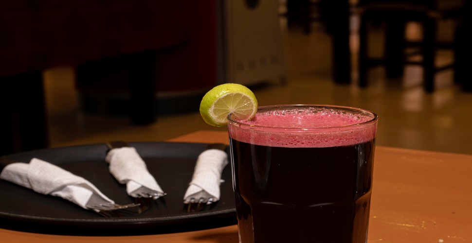 The unique flavors of Peru come alive with chicha morada, a traditional beverage made from purple corn, fruits, and spices. This refreshing drink is perfect for hot days on your Peru tour packages and has a deep purple color and sweet, tangy flavor.