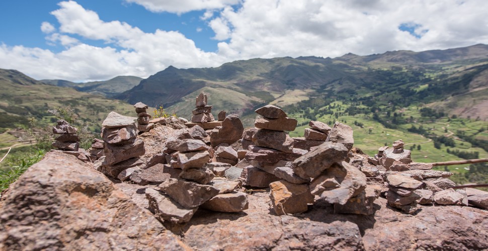 When you visit Pisac on a Sacred Valley tour from Cusco, you will see apachetas. They are often built as part of a ritual or offering to the mountain spirits (Apus) and other Andean deities, asking for protection and blessings.