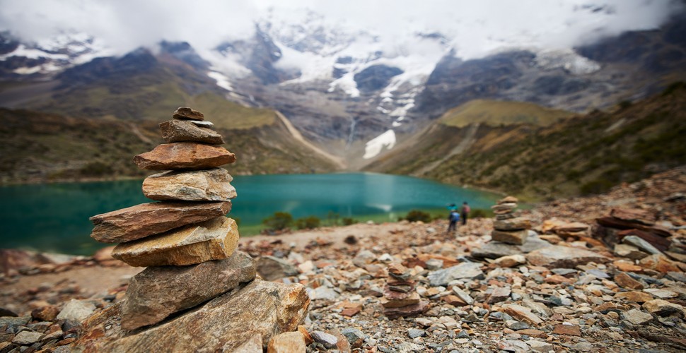Humantay Lake is a popular destination for trekkers on the Salkantay Trek to Machu Picchu. Visitors to Humantay Lagoon sometimes build small apachetas as a way to connect with the sacredness of the place and to show respect for the local traditions.