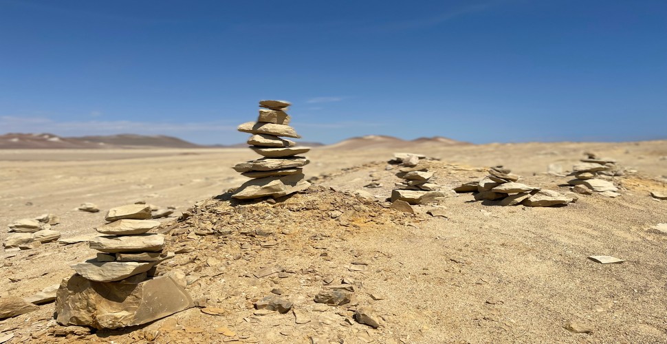 When you visit Ica and The Paracas Reserve,  on Ica Peru tours, you can find small apachetas. These cairns are often built by visitors as a way to leave a mark or make a connection with the natural surroundings. 