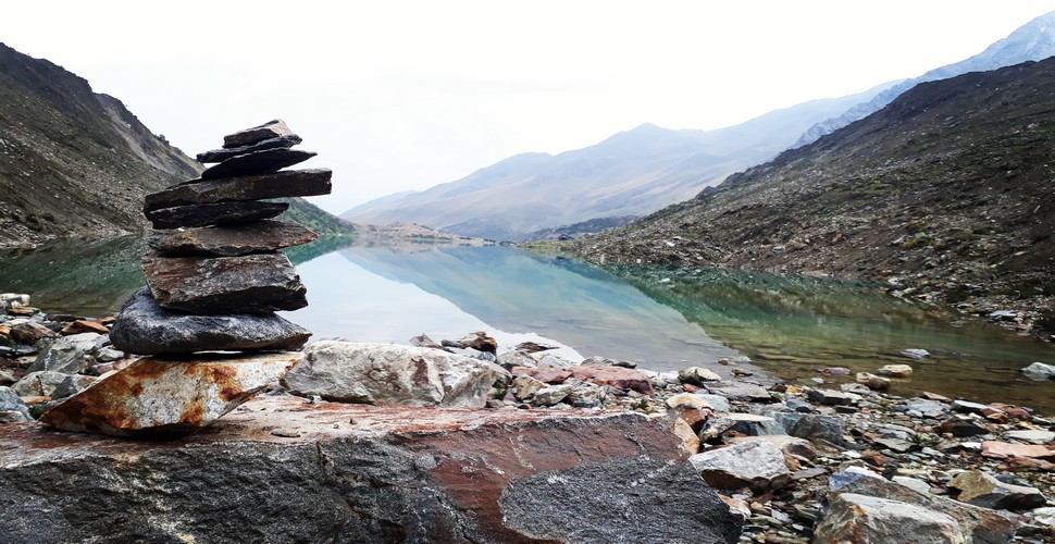Andean lakes are often considered sacred in indigenous Andean cultures. They are frequently surrounded by spiritual significance. The ritual of building an apacheta near Humantay Lake for example, on your Peru getaway, often involves placing stones while making a wish or offering a prayer.