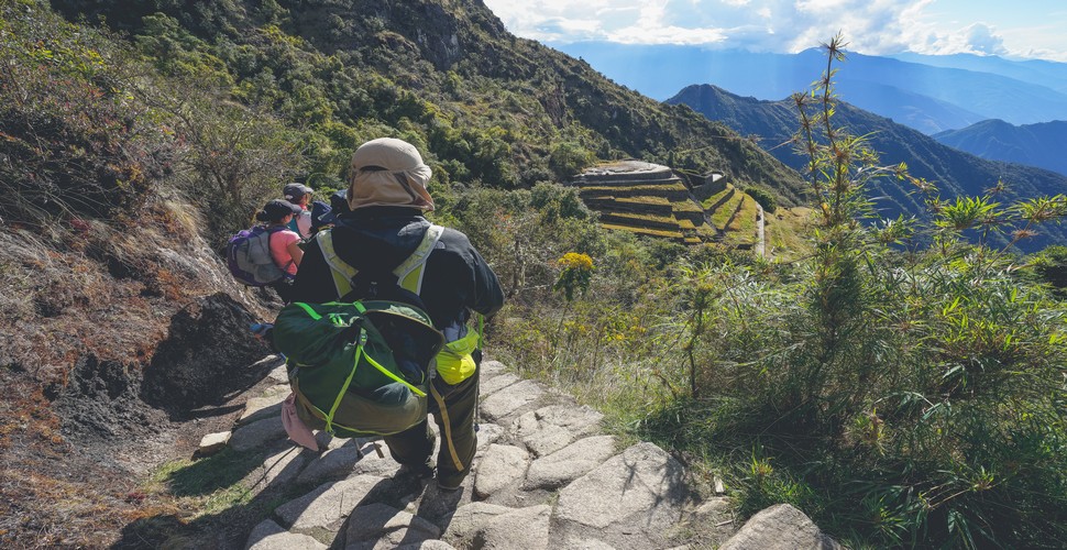 Arriving at Machu Picchu on one of the Inca Trail trips is a truly unforgettable experience. It culminates in a breathtaking and awe-inspiring view of the ancient citadel from above. The focal point is The Sun Gate, where trekkers pause and take in the stunning sight.